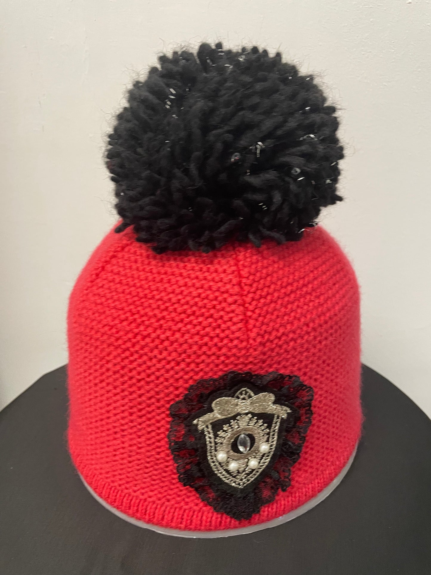 Strickhaube mit Bommel